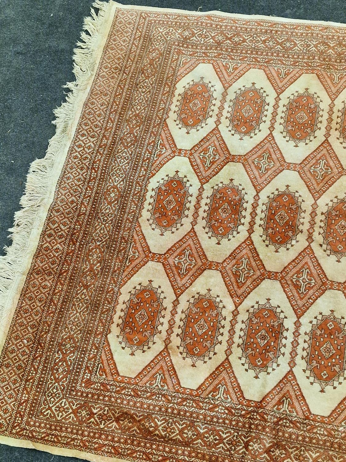 Vintage patterned carpet on beige ground 188x135cm. - Image 2 of 4
