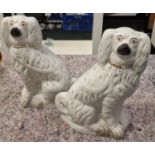 Pair of large Staffordshire flat back spaniels.