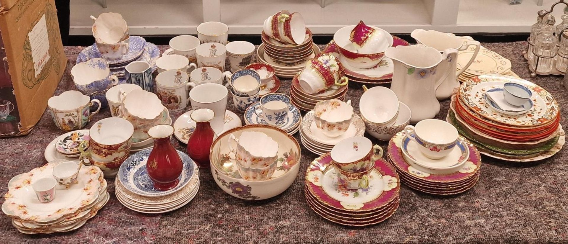 Large collection of vintage cabinet chinaware to include commemorative items and tea set residues.