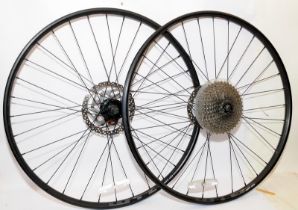 WTB STx-I23 fron and rear cycle wheels. 29" rim disc brakes and 10 gear hub attached