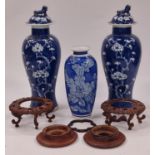 Pair of Chinese cobalt blue lidded ginger jars each 32cm tall together with another vase and some