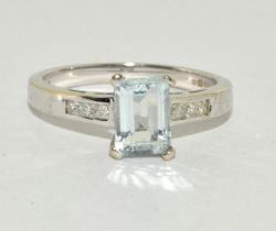Natural aquamarine and Diamond 9ct gold ring Size N.