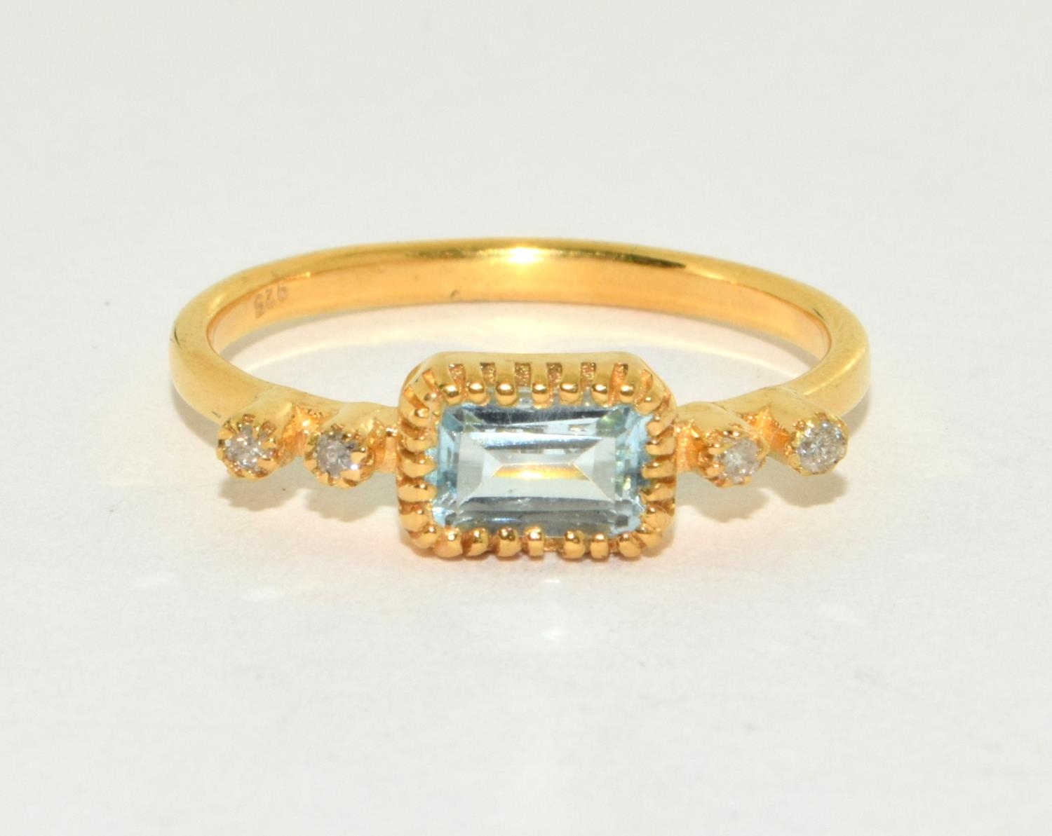 A natural aquamarine and diamond gold on silver ring Size N 1/2.