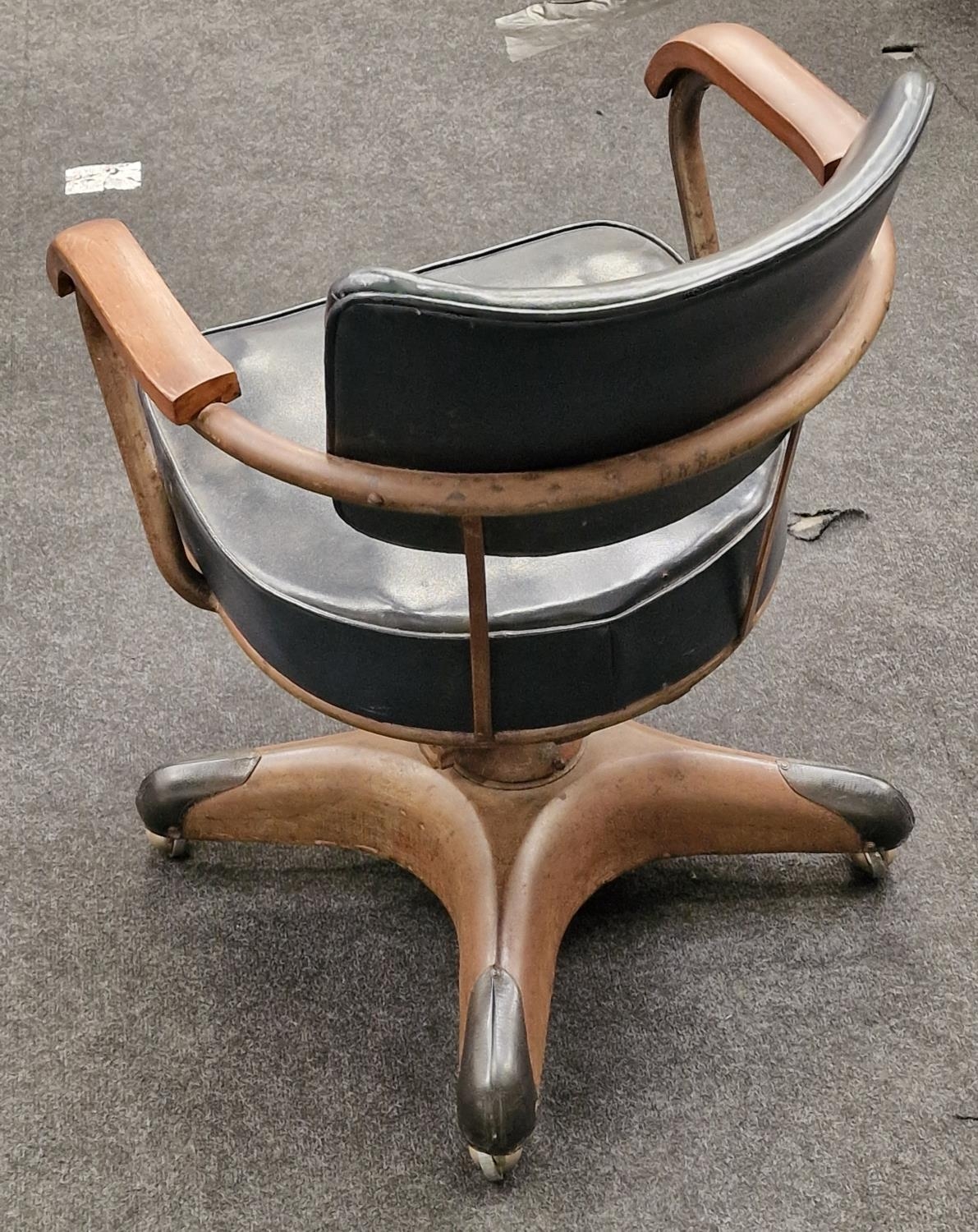 Revolving mid century office chair with cast metal base and casters, set on wooden arm rests - Image 2 of 3