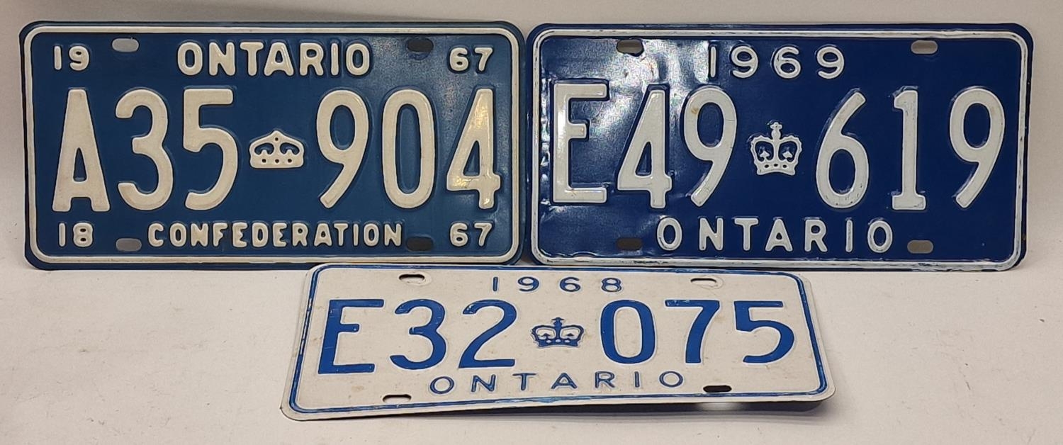 3 x vitreous Canadian car number plates from the 1960s 30x15cm each