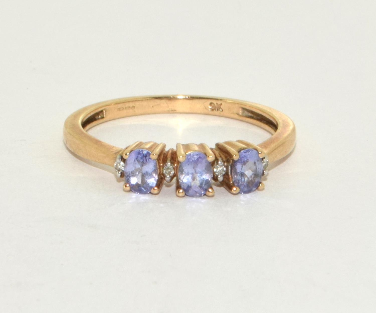 9ct gold ladies Diamond and Amethyst ring size O