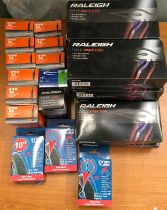 Quantity of new and boxed inner tubes, sizes 10" to 12.5". 23 boxes in total. Various makes