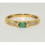 Emerald and Diamond 9ct gold ring, 2.2g Size N