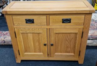 Contemporary light oak 2 door 2 draw cabinet with drop handles 78x98x35cm