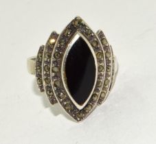 A stepped vintage art deco style jet and marcasite ring size P