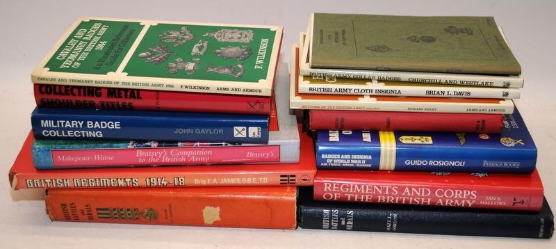 A collection of reference works relating to collecting military badges and insignia. 14 books in lot