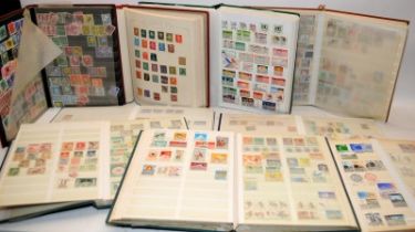 A collection of stamp albums and stock books, most are well filled with world stamps. 9 albums in