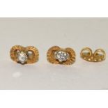 Pair 18ct gold and Diamond studs (1 back missing) 2.4g