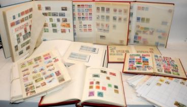 A collection of stamp albums and stock books well filled with world stamps. 7 albums in lot c/w a