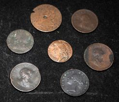 A small collection of antique copper coins to include James II Gun Money Shilling dated August 1689.