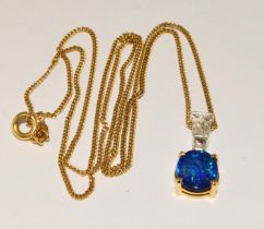 Opal/Diamond 18ct gold pendant on 18ct gold chain, 4.8g total and boxed.