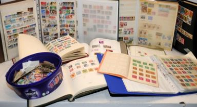 A collection of stamp albums and stock books well filled with world stamps. 10 albums and a tub of