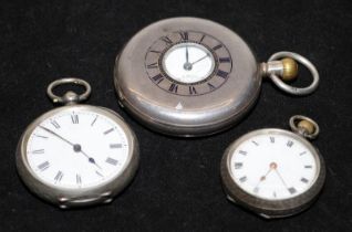A small collection of 3 silver cased pocket watches including a half hunter, all requiring attention