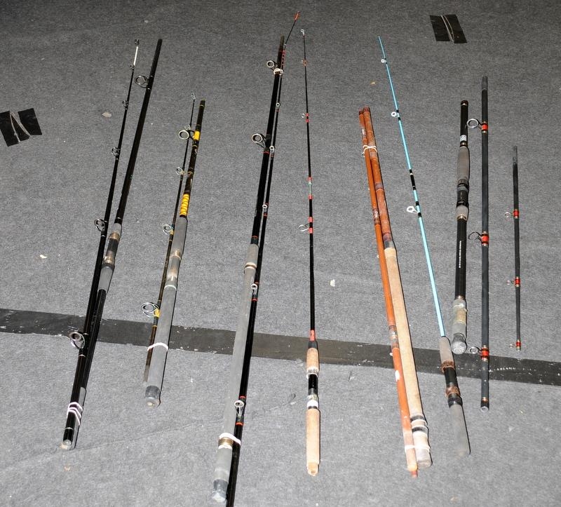 A quantity of vintage boat and beach fishing rods. Various makes and sizes