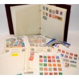 A small collection of stamps. in albums and loose sheets