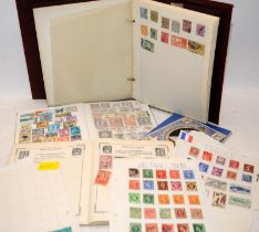 A small collection of stamps. in albums and loose sheets