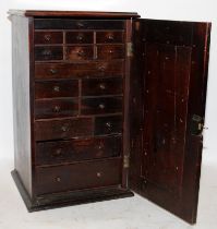 Edwardian Wellington / Engineers dark wood chest of 16 various sized drawers, all with dovetail