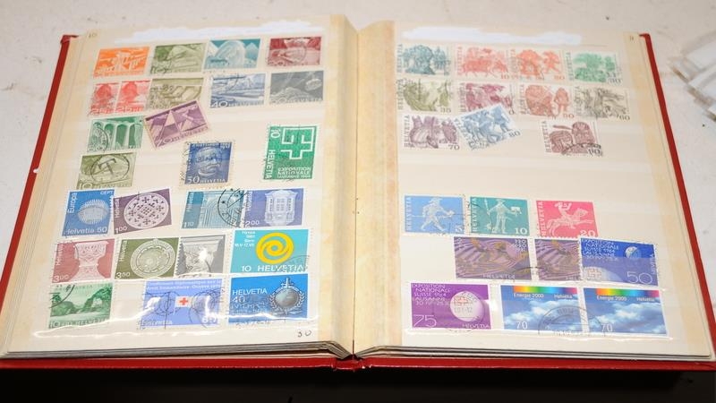 A collection of stamp albums and stock books well filled with world stamps. 7 albums in lot c/w a - Image 3 of 11