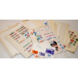 Folder containing a selection of stock sheets and loose album pages of world stamps including