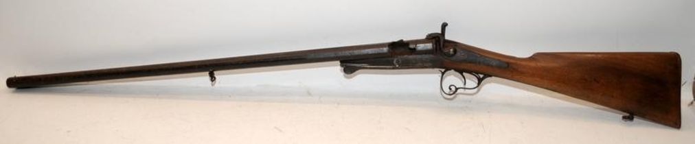 Antique Twin barreled break barrel shotgun. Wall hanger for decorative purposes only. O/all length