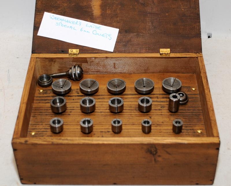 Watch makers lathe special 6mm collet set housed in a hinged wooden box. From a working environment,