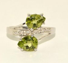 A 925 silver and peridot TGGC ring Size P 1/2.