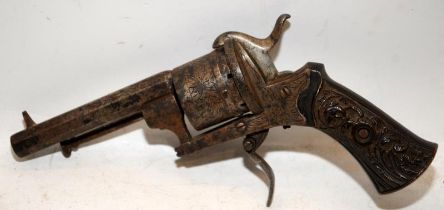 Antique 6 shot pin fire revolver with folding trigger. Mechanism functions but may require some