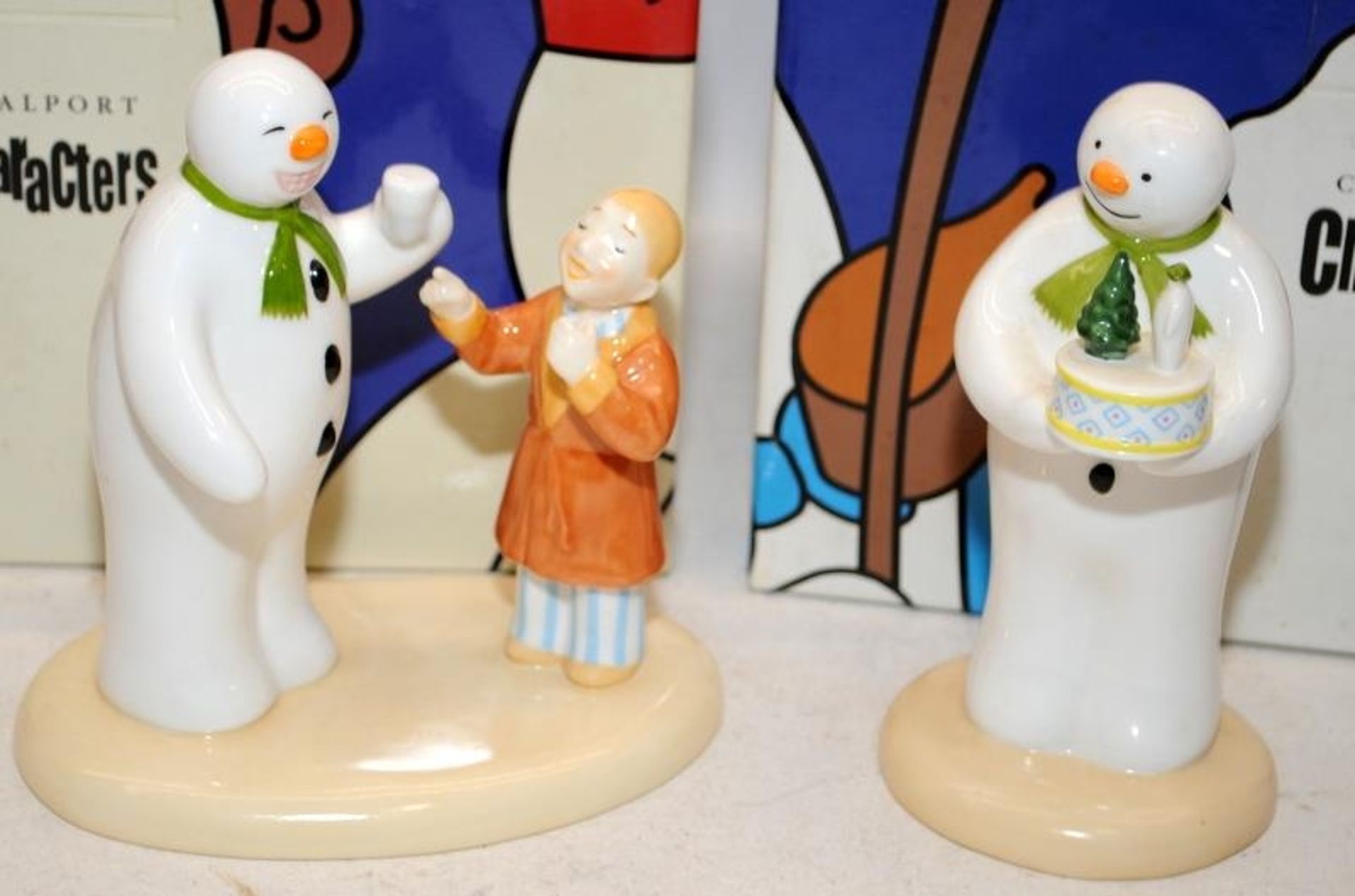 2 x Coalport The Snowman Figurines: Snowman's Surprise c/w Toothy Grin (limited edition with