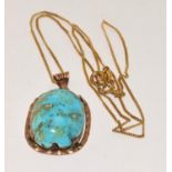 10ct gold Turquoise large single stone pendant necklace on a 9ct gold chain, length of chain 42cm