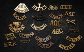 A good collection of Mostly WWI Brass Military Shoulder Title badges including scarce examples, some