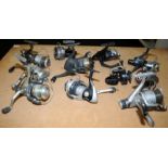 A collection of course fishing fixed spool reels including Mitchell, Okuma and Caperlan. 11 in lot