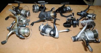 A collection of course fishing fixed spool reels including Mitchell, Okuma and Caperlan. 11 in lot