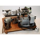 Quality vintage watchmakers/jewellers lathe mounted on board c/w motor and accessories. From a