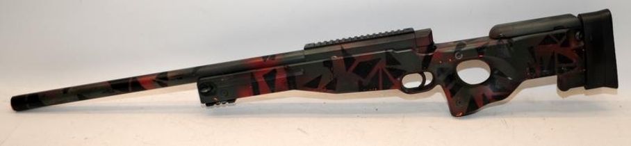 .6mm single shot bolt action BB air rifle in camouflage casing. Cocks and discharges, not tested