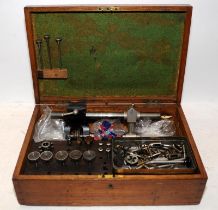 Vintage watch maker/jewellers lathe c/w accessories housed in a hinged wooden box. From a working