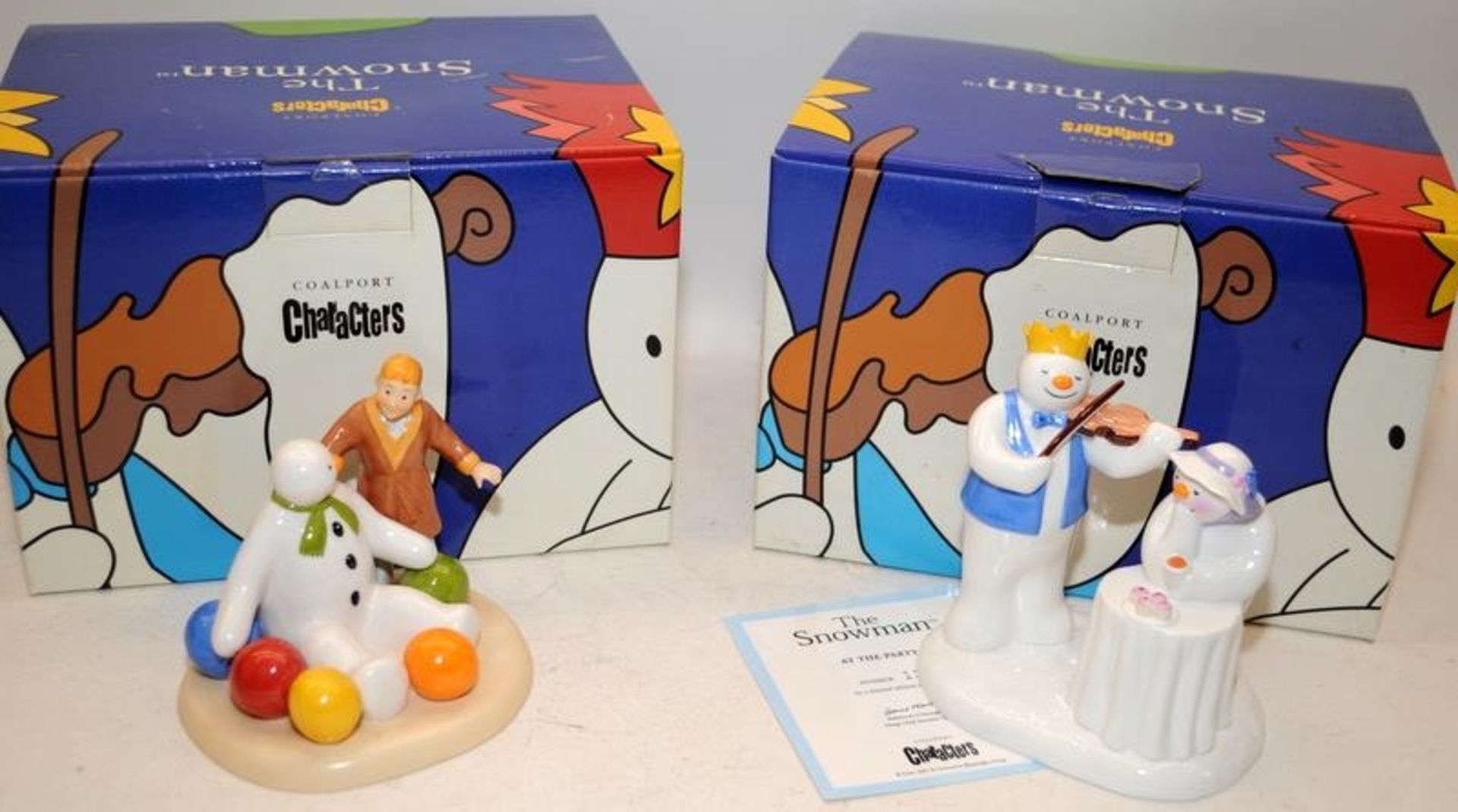 2 x Coalport The Snowman figurines: At The Party - Limited Edition 1199/2000 c/w Soft Landing.