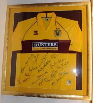 Framed and signed Burnley Football Club away kit jersey 2006-2007 season. Hunters Estate Agents