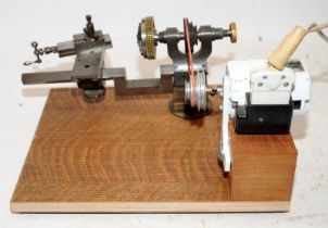 Watchmaker / Jeweller / Modelmaker lathe powered by foot operated sewing machine motor