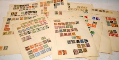 A collection of mostly Pre-War Dutch Indian, Portuguese Indian and French Indian postage stamps.