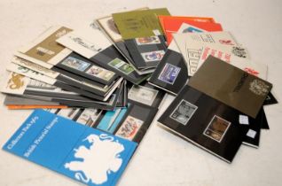 A collection of early pre-decimal Royal Mail stamps presentation packs including rare Churchill