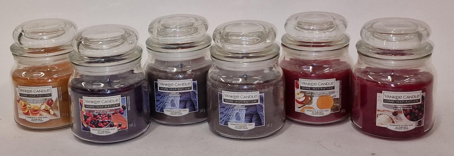 Six assorted Yankee candles (225,226)