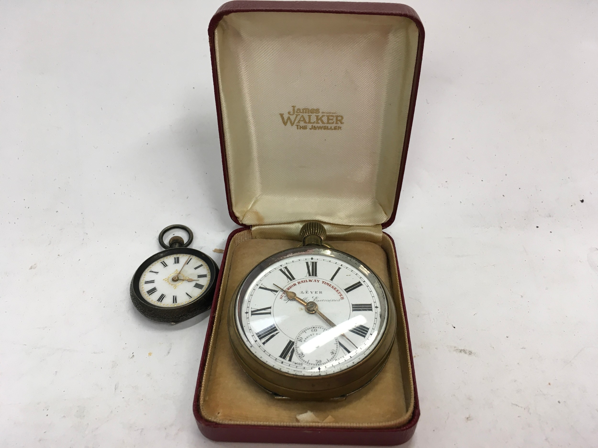 Superior Railway Timekeeper pocket watch together another silver pocket watch