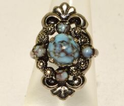 A 925 silver and turquoise vintage ring Size K