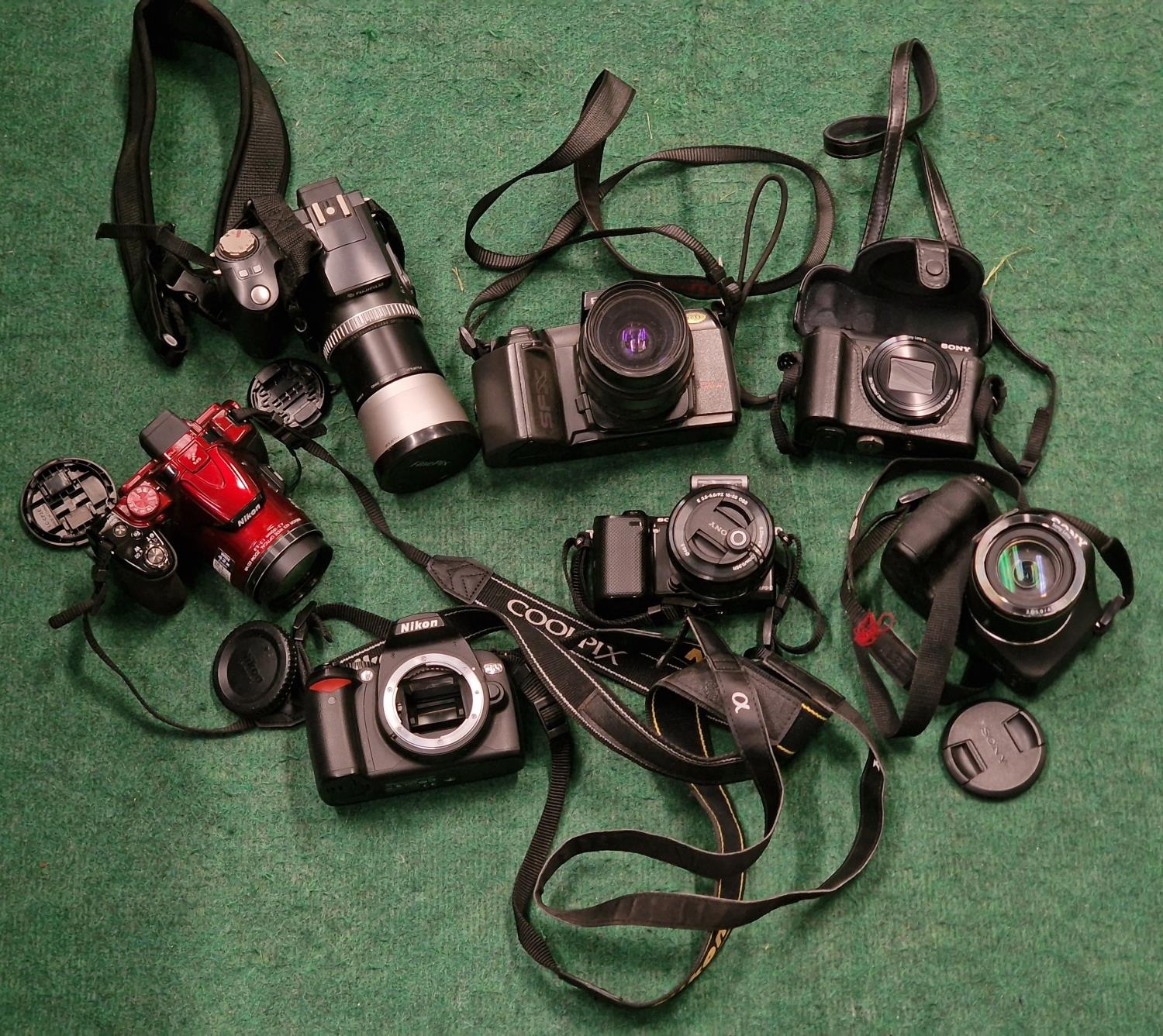 Selection OF 7 various cameras. Here we have makes - Nikon D60 -Sony DSC H300 - Sony Self 1650 -