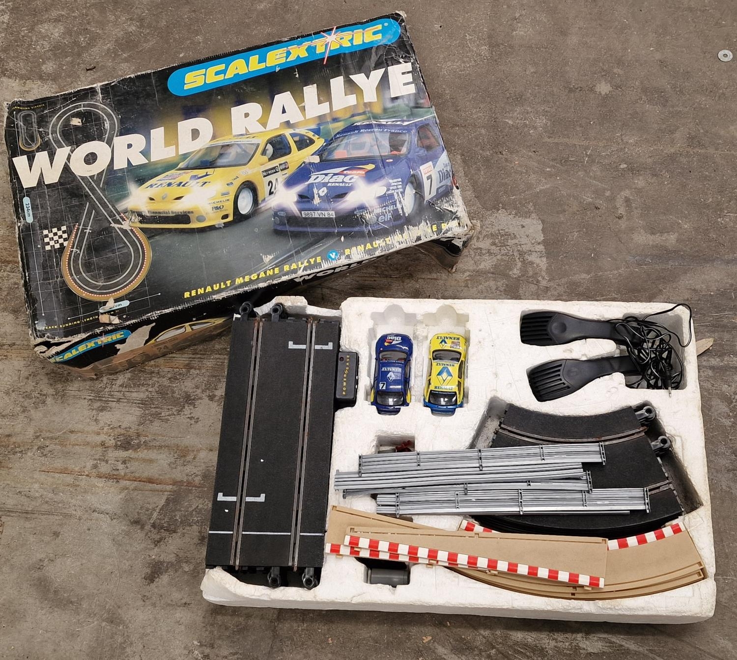 Scalextric World Rally E racing set in original (tatty) box. Not checked for completeness (REF 114).